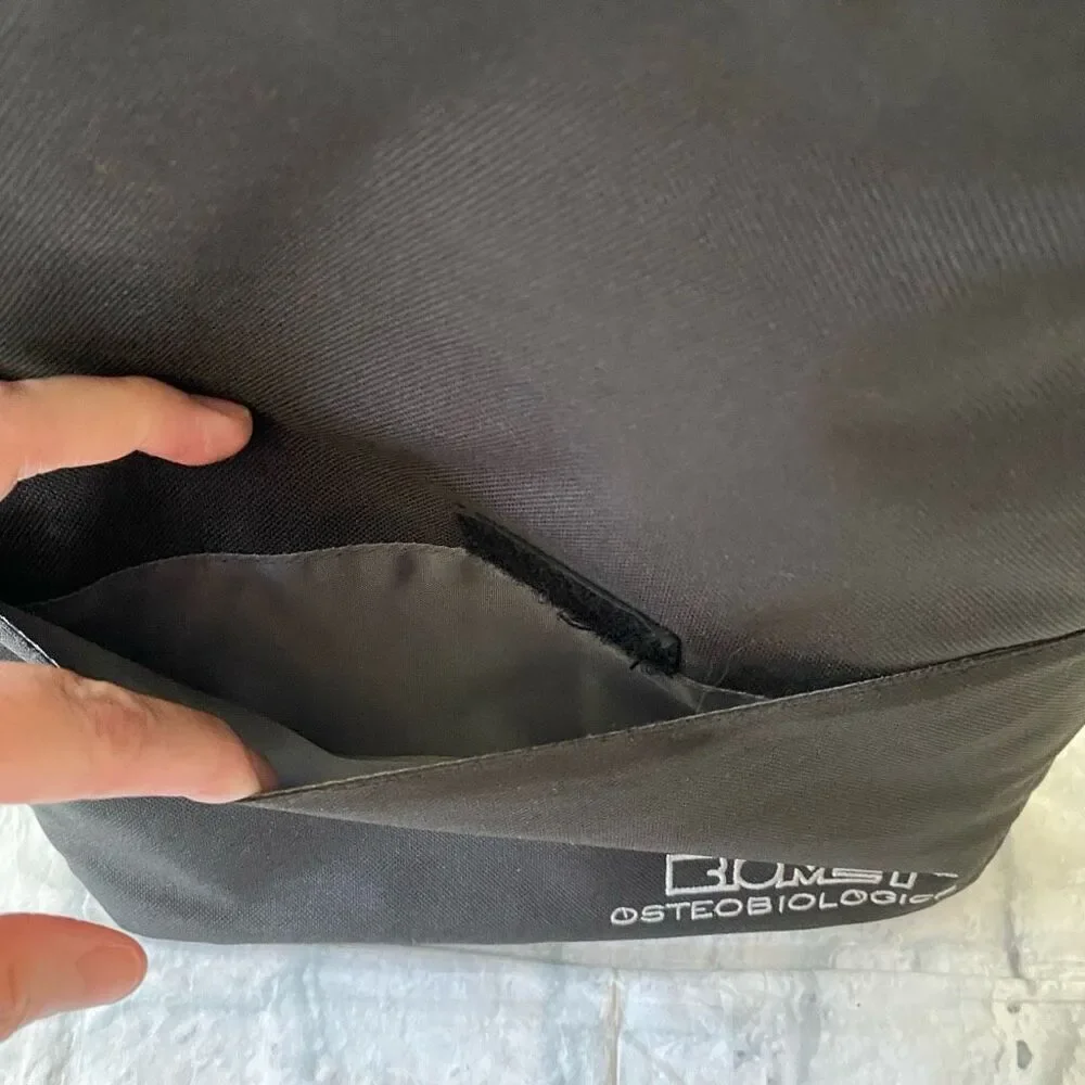 Laptop or work bag w/one main compartment and multiple inner & outer pockets